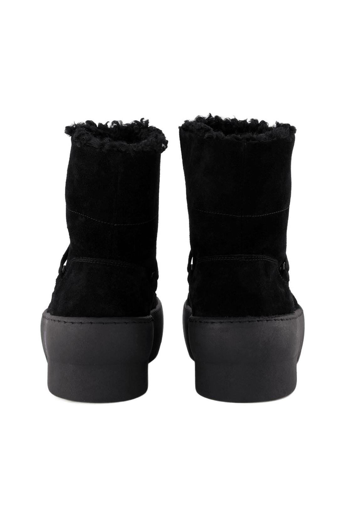 Chunky Sole Schnürstiefeletten aus schwarzem Leder