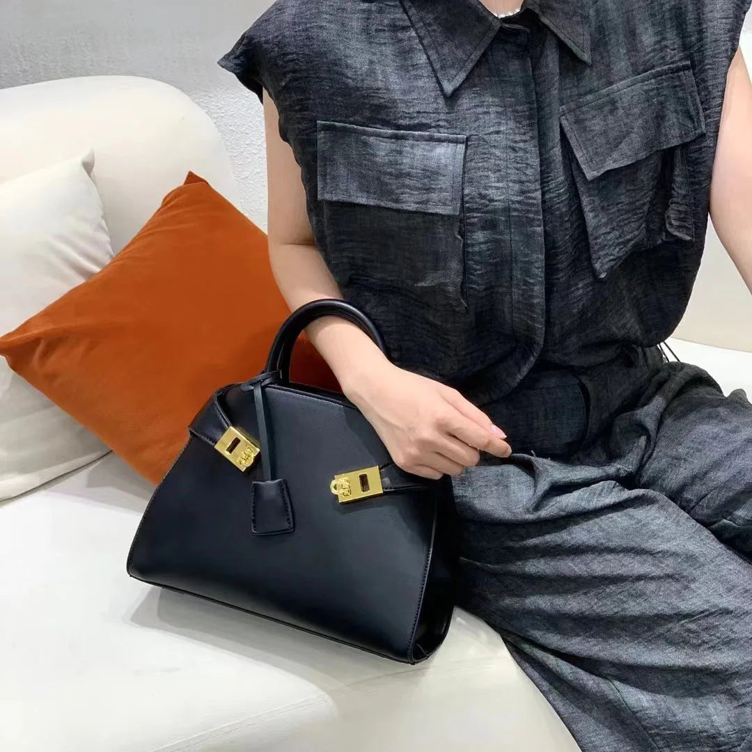 Ari modern classic shell bag – soft structured style double lock charm