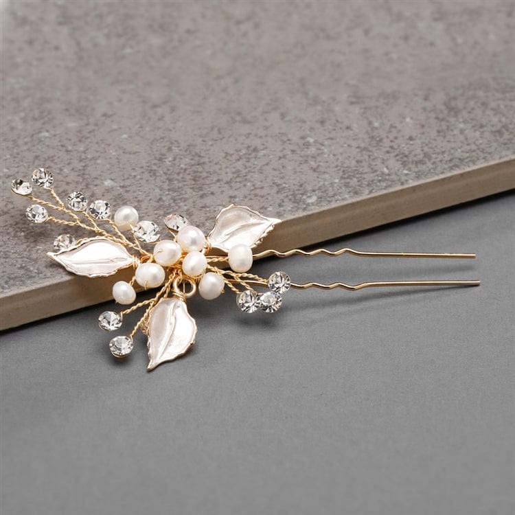 Haarnadel mit silbernen oder goldenen Blättern